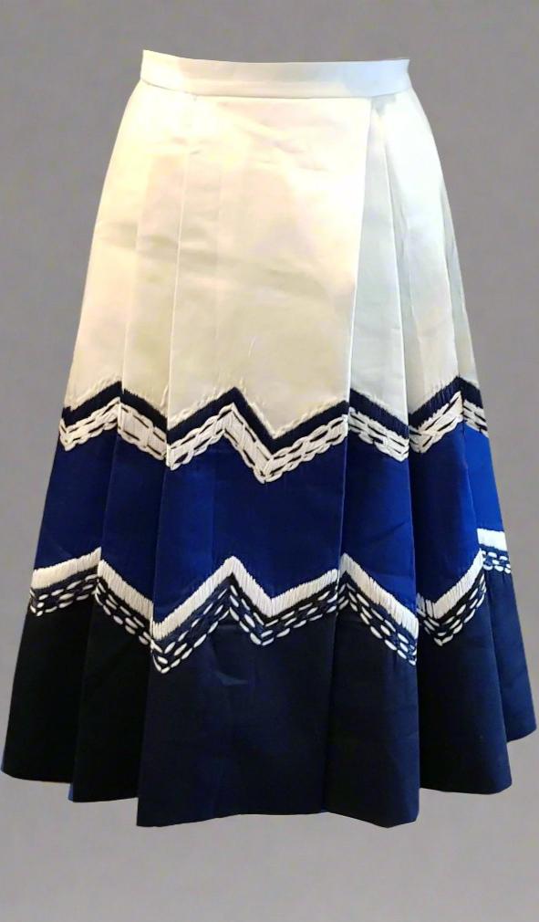 MARQUEE PLEATED SKIRT